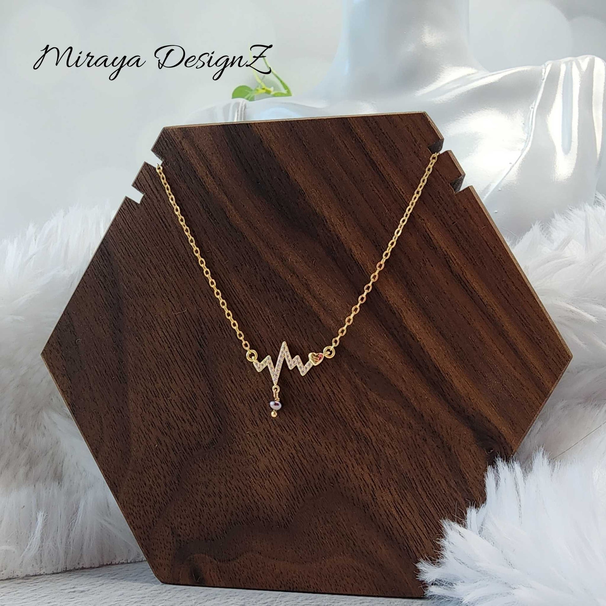 Gold sales pulse necklace